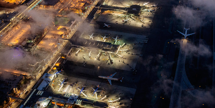 High angle view of airport illuminated at night, Los Angeles, California, USA